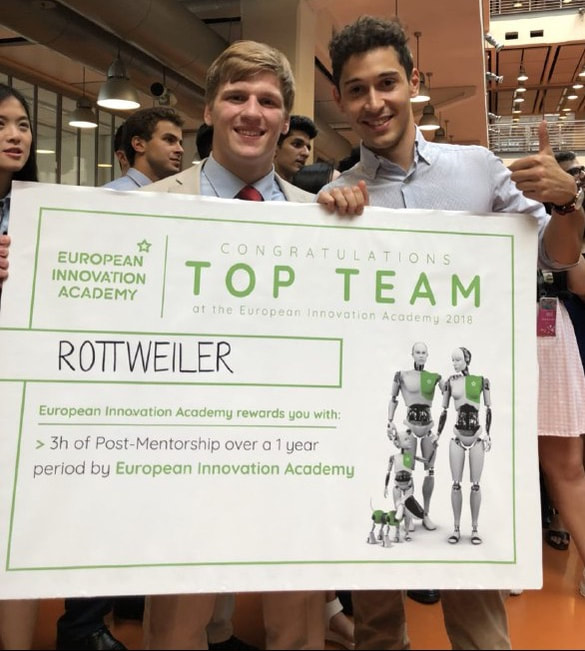 Jack and Andrea holding their award for Top Team at the European Innovation Academy